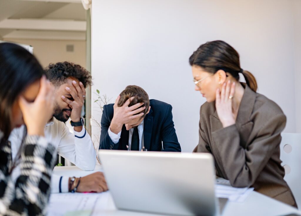 Business team analyzing operational bottlenecks and scaling strategies through nearshoring.